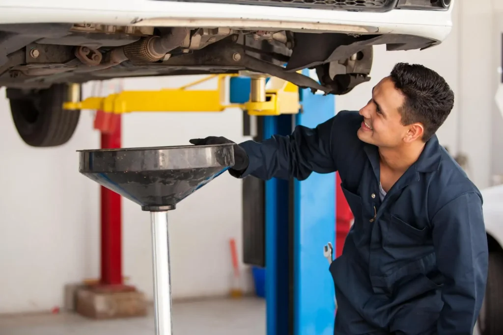 A picture of a mechanic performing a car service, such as an oil change. This adds a sense of professionalism and expertise to your advice.
